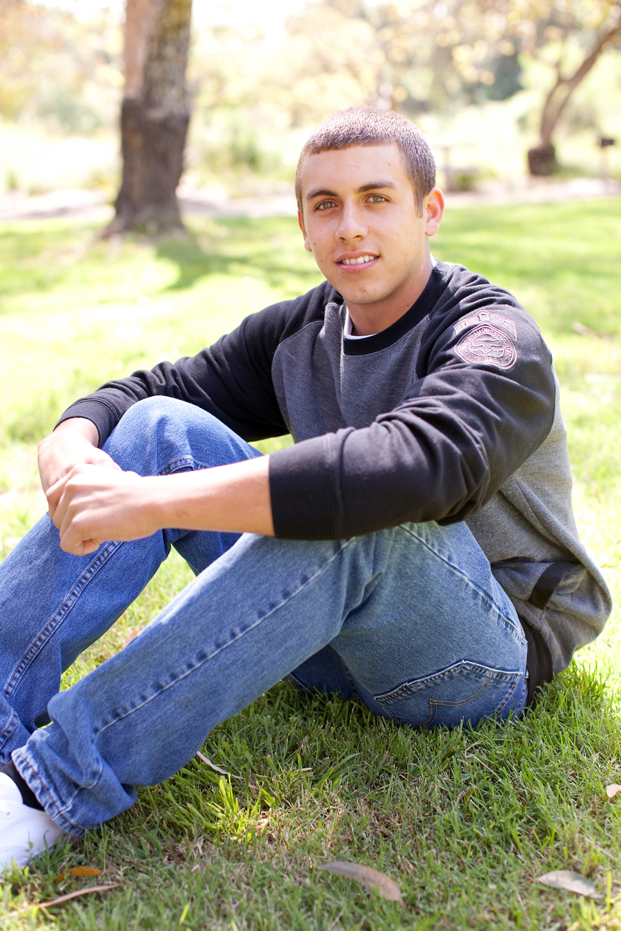In Gilroy, Tyler strikes a serious pose for his senior portraits.