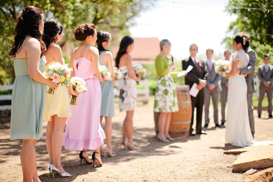 The bridesmaids dressed in different colors for the Santa Margarita wedding.