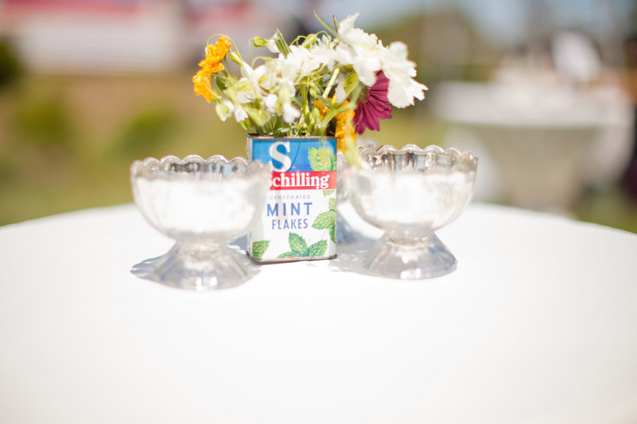An old mint can holds flowers at the cocktail hour at Santa Margarita Ranch.