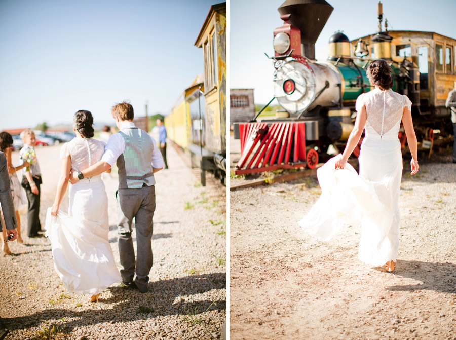 The couple takes pictures by the train at Santa Margarita Ranch.