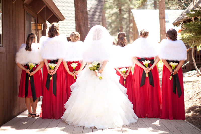 Fur shawls and bridesmaid bouquets for a Lake Tahoe wedding.