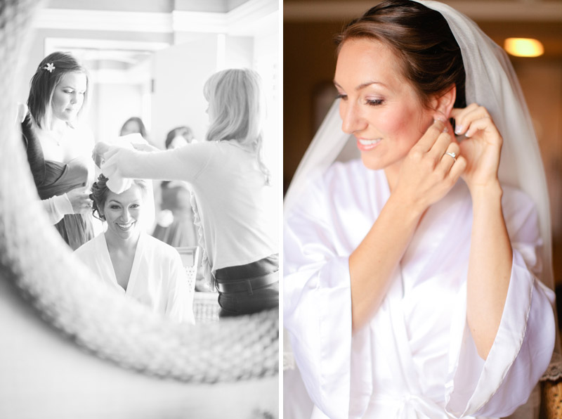 Brittany puts her wedding veil and earrings on in the mirror at Portola Hotel in Monterey.