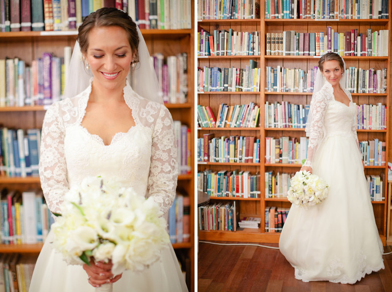 At the Monterey Mayflower Presbyterian church, the bride smiles in front of the bookshelf before the wedding.