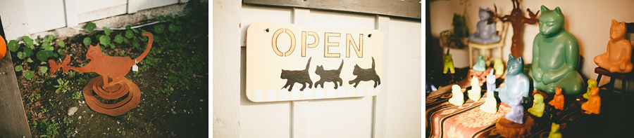 Open sign with cats on it.