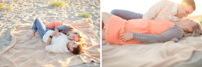 They lay on the sand for their Santa Cruz engagement pictures.